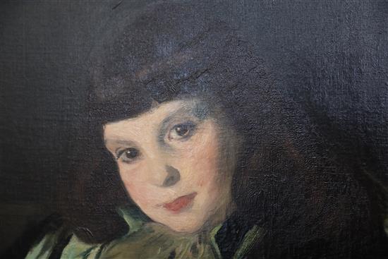 Jacques Emile Blanche (1861-1942) Portrait of a girl, seated in a green chair 50.5 x 30.25in.